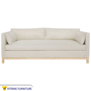 Off white sofa with armrests cushions