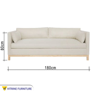 Off white sofa with armrests cushions