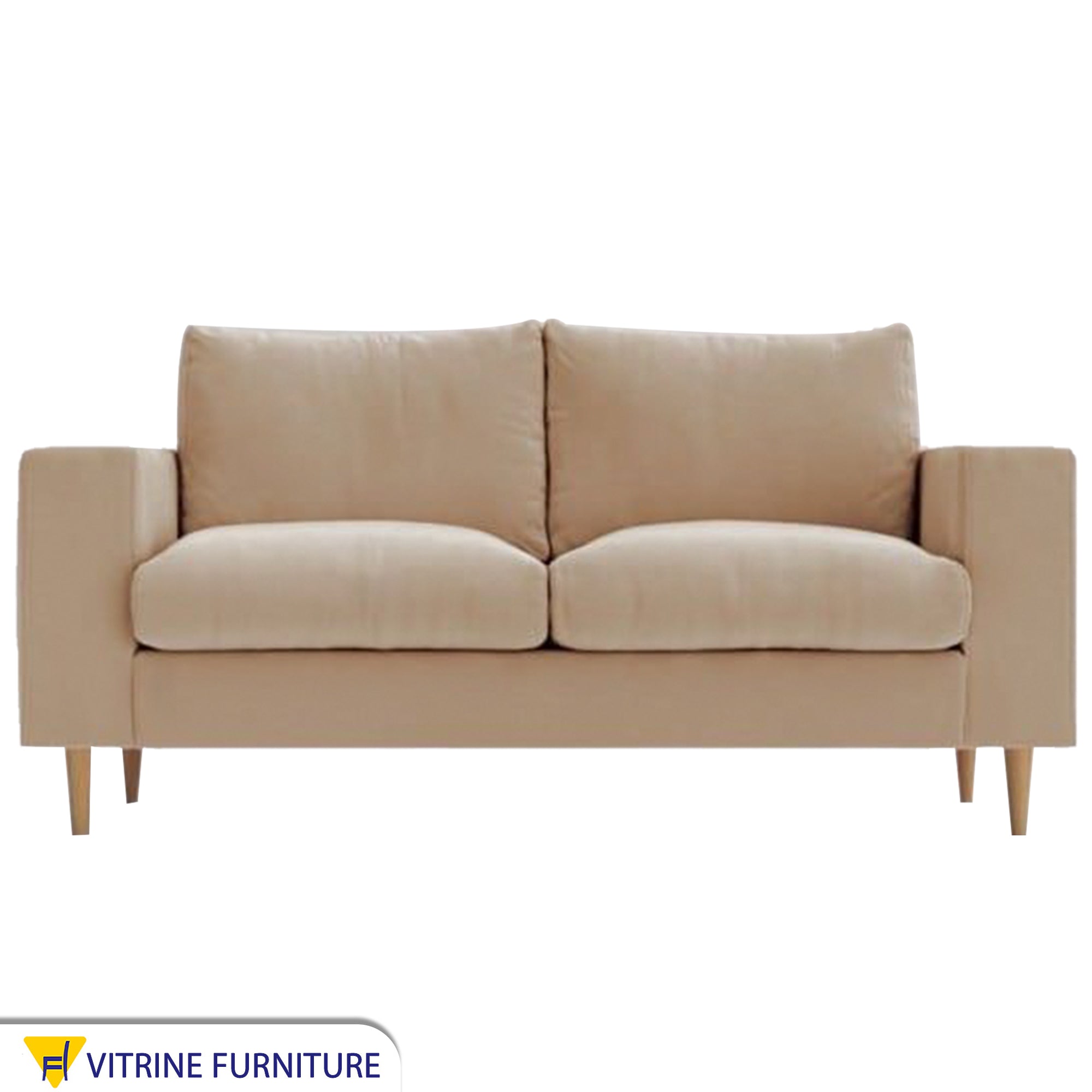 Beige sofa with puffy pillows