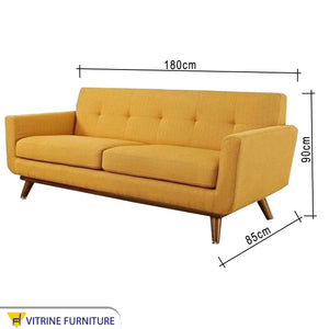 Camel yellow sofa with slanted legs