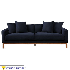 Navy sofa with short wooden legs