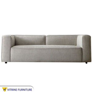 Gray sofa with elegant flowing lines