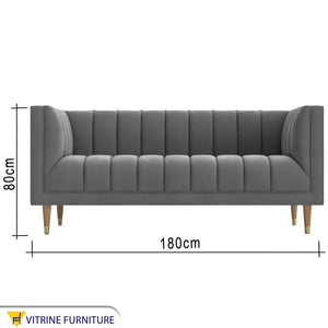 Gray sofa with recessed lines on the back and base