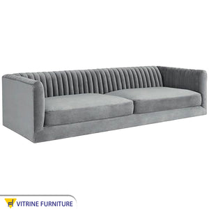 Gray sofa with folded backrest