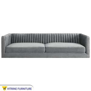 Gray sofa with folded backrest