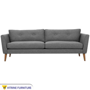 Gray sofa with high legs