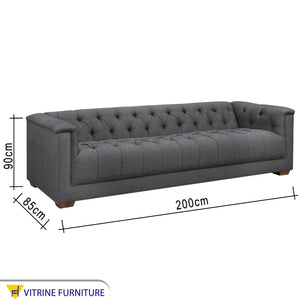 Dark gray sofa with high armrests