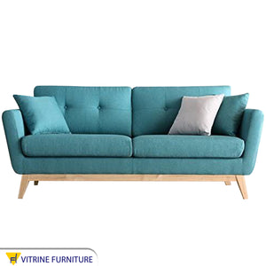 Baby blue sofa
