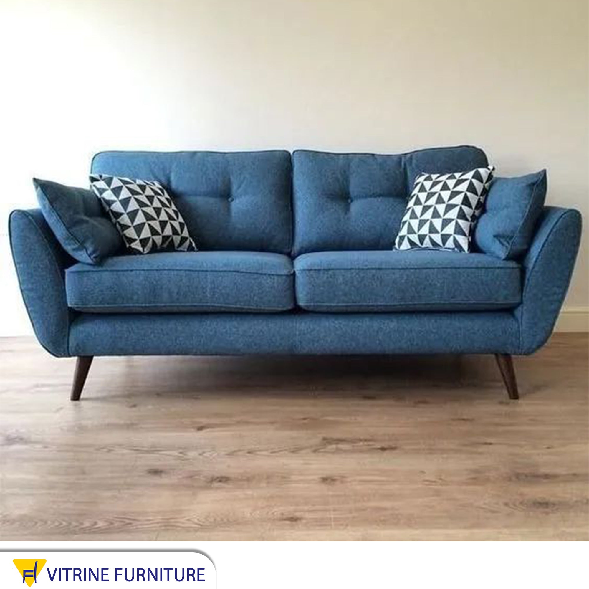 Navy sofa with curved armrests