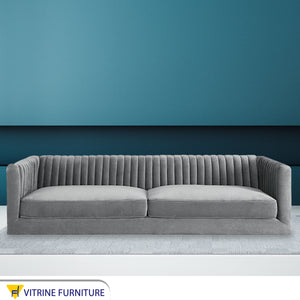 Gray sofa with folded backrest