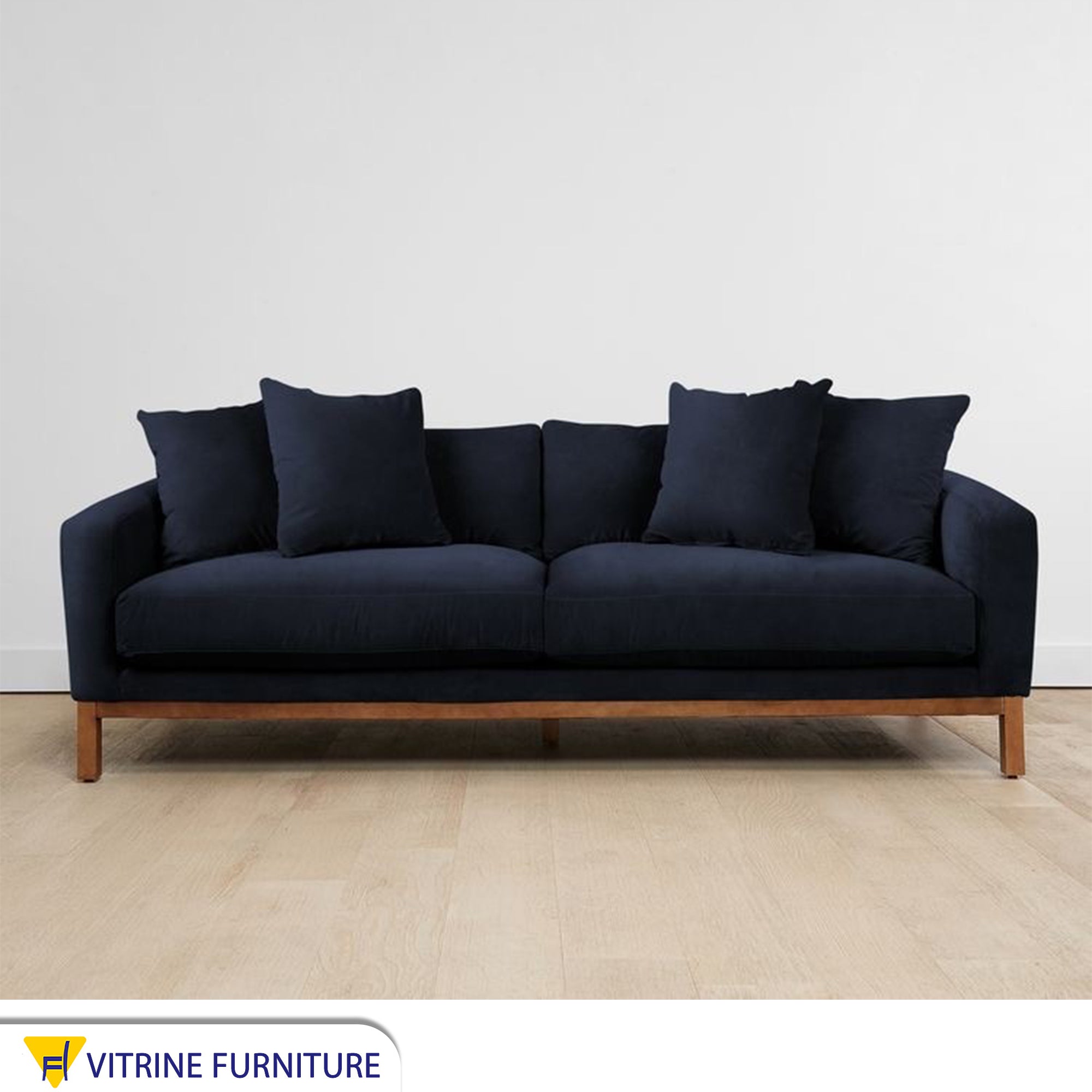 Navy sofa with short wooden legs