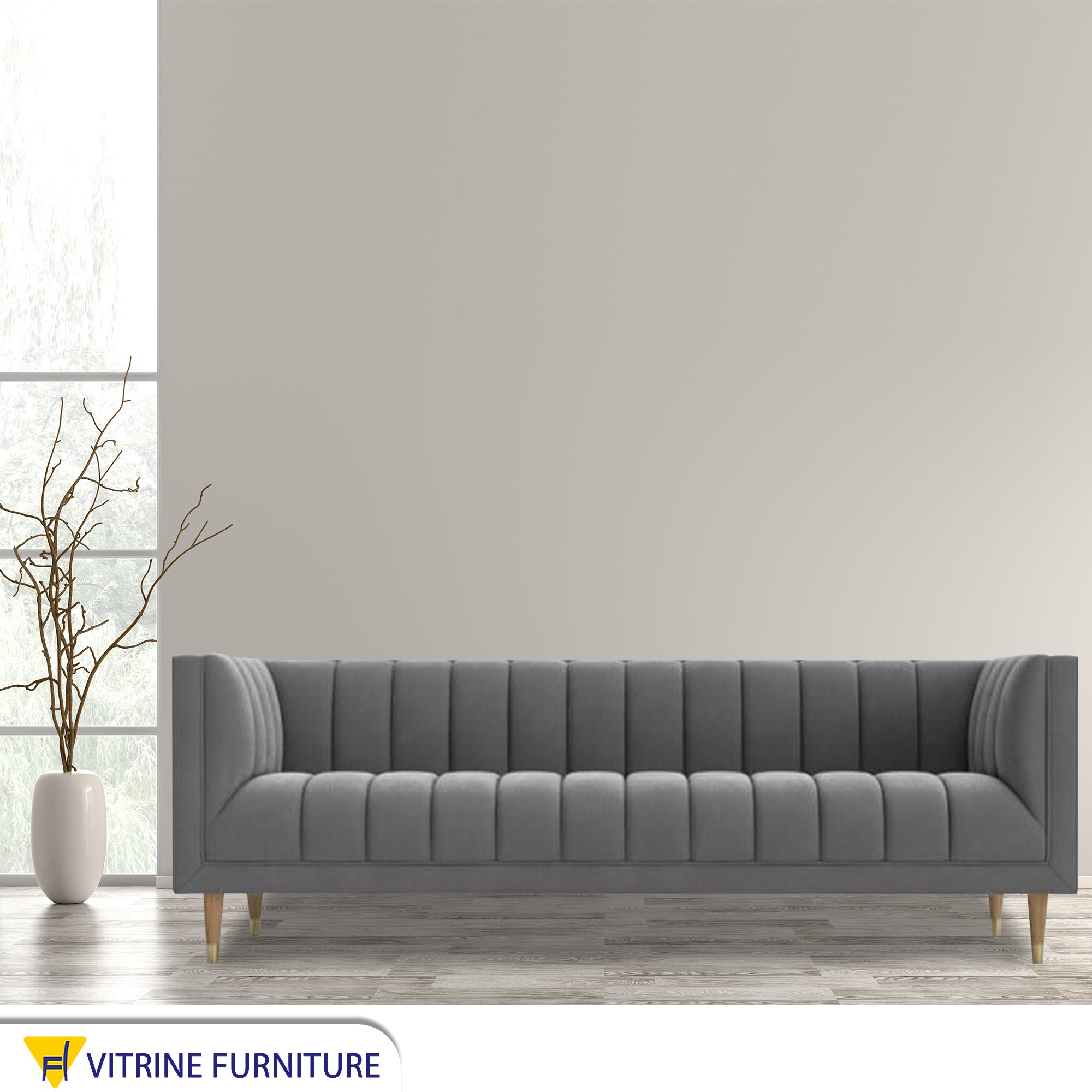 Gray sofa with recessed lines on the back and base