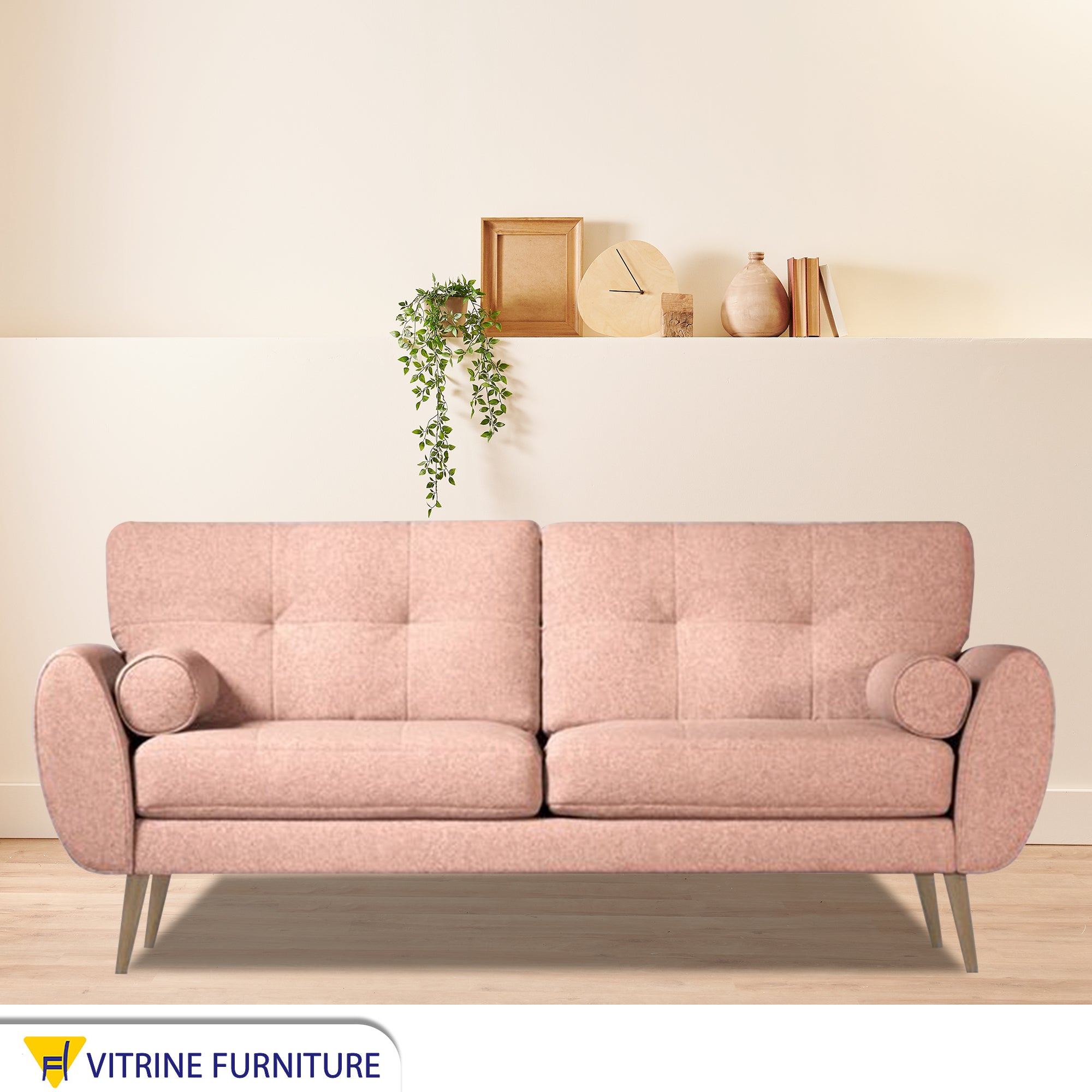 Pink sofa high on elegant wooden legs