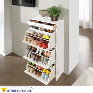 Shoe cabinet with three drawers