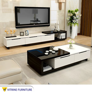 A black and white TV table and middle table
