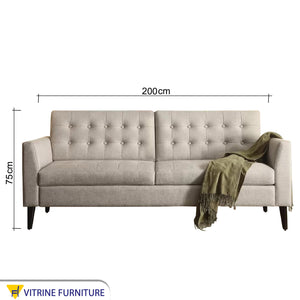 Big sofa with raised legs