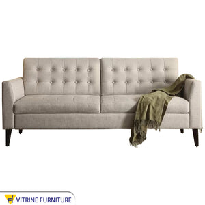 Big sofa with raised legs