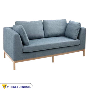 A sofa with movable base and back cushions