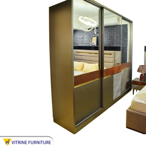 Beige brown bedroom with half height mirrored wardrobe