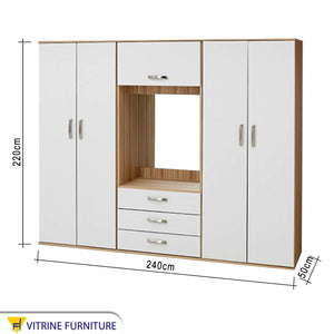 A four-doors wardrobe with a white dresser in the middle