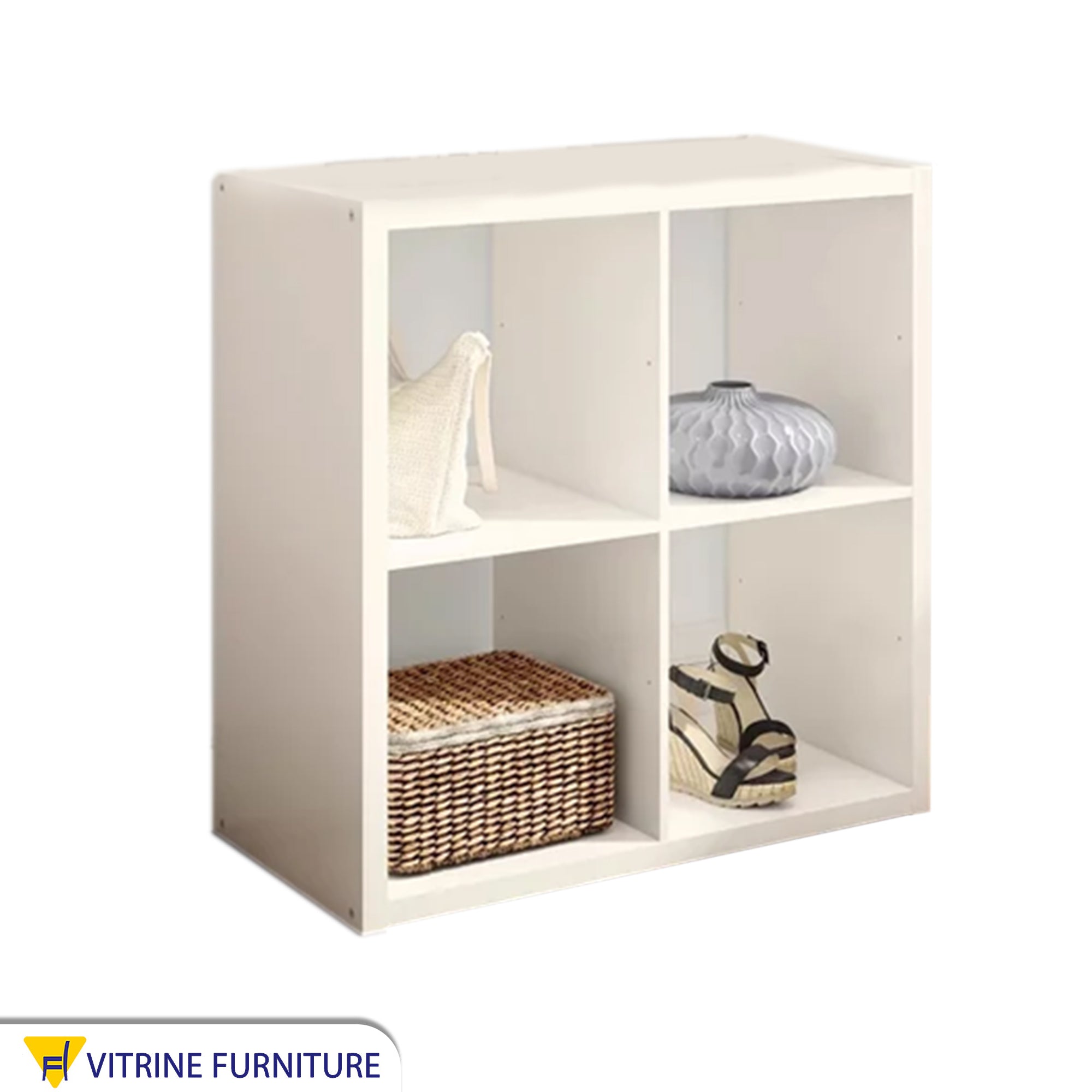 A small decorative piece for divided shelves in white