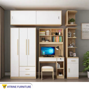 A wardrobe made of integrated storage pieces in beige and white