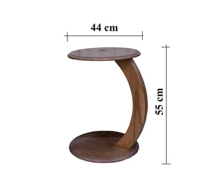 A table with artistic and functional creativity in the shape of the letter S