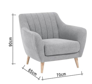 A light gray footstool with recessed longitudinal lines