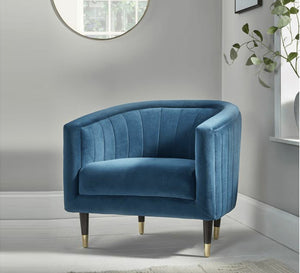 A blue floral chair with longitudinal stitching from the inside and outside