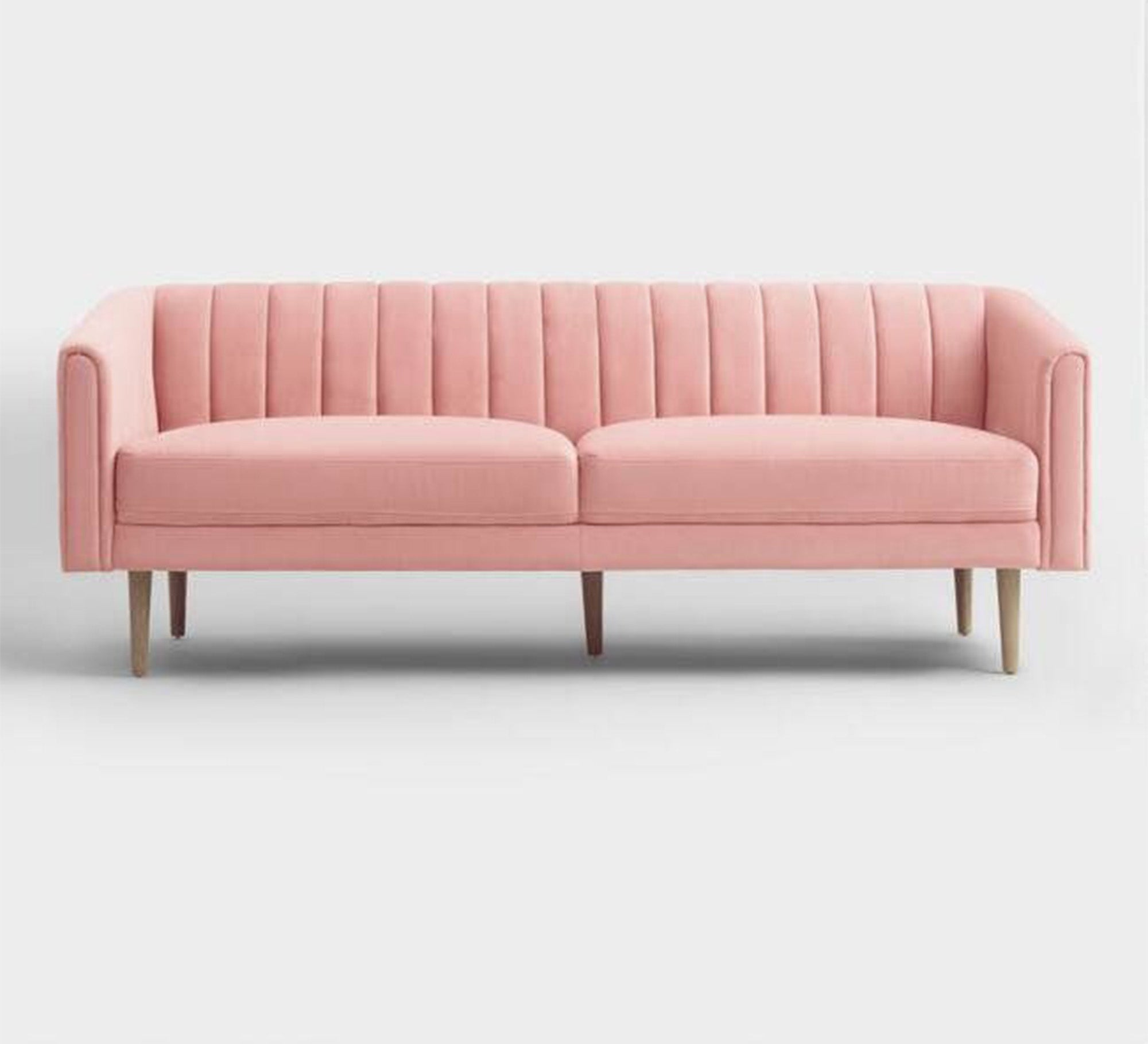 A pink parallelepiped capotone sofa