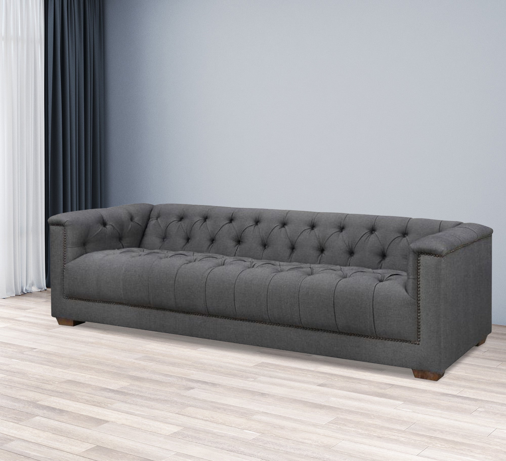 Dark gray sofa with high armrests