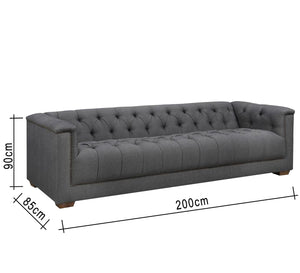 Dark gray sofa with high armrests