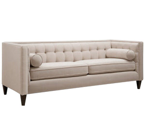 Beige sofa with capotonite beads in the back