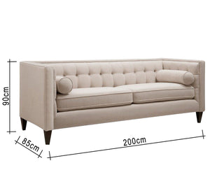 Beige sofa with capotonite beads in the back