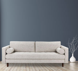 A sofa with a simple streamlined design