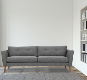 Gray sofa with high legs