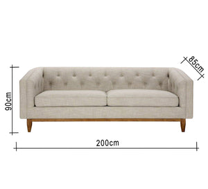 A beige sofa with capotonite grains, with armrests and backrest