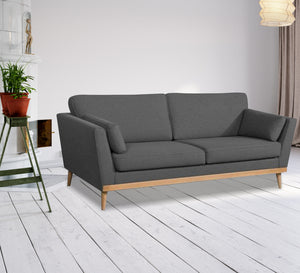 Dark gray high sofa on wooden legs