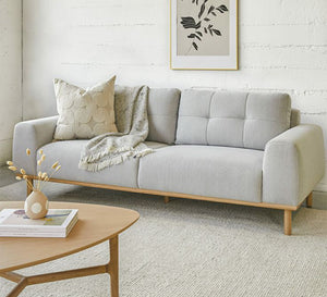 Grey sofa with capotonian grains with backrest