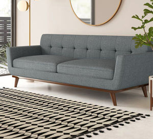 Gray sofa with slanted legs