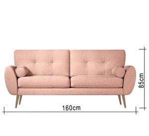 Pink sofa high on elegant wooden legs