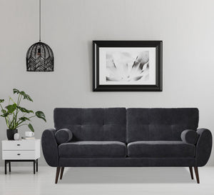 A high black sofa on elegant wooden legs