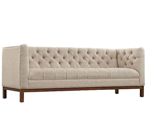 Beige sofa with capotonite grains on the back and the handle