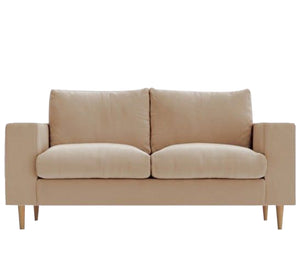 Beige sofa with comfortable cushions and wooden legs