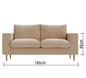 Beige sofa with comfortable cushions and wooden legs