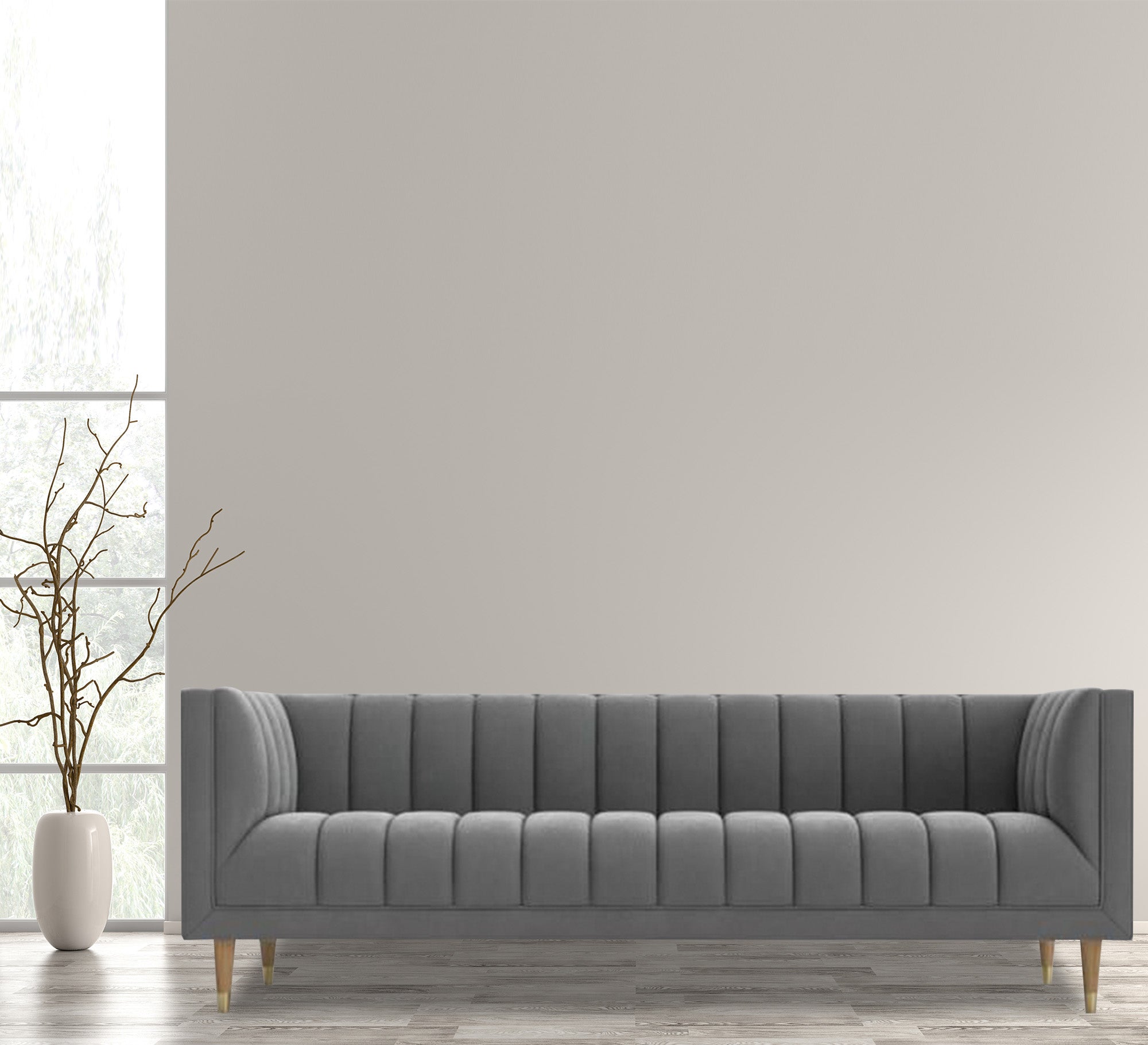 Gray sofa with recessed lines on the back and base