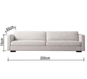 White sofa with thin armrests