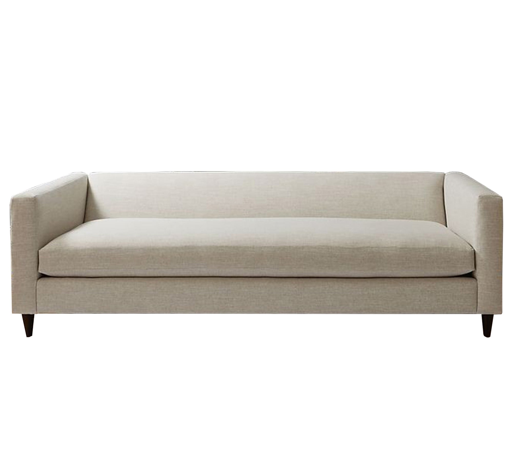 Off white sofa with attached back and armrests