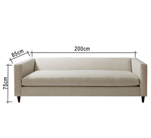 Off white sofa with attached back and armrests