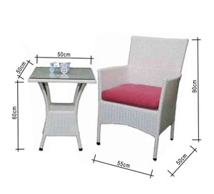 An outdoor seating set with a square table